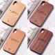 Mobile phone case made of solid wood