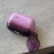 The Earphone Case Is Tinted With Purple Ink