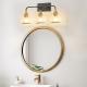 23in Modern 3-Light Vanity Wall Sconce - Black And Gold Bathroom Light Fixture With Clear Glass Shades, Industrial Wall Mounted Lamp For Mirror, Vanity, And Living Spaces Bulb Not Included