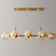 Sleek, Light-Luxury Creative Long Glass-Ball Pendant Light For Bedrooms And Dining Rooms